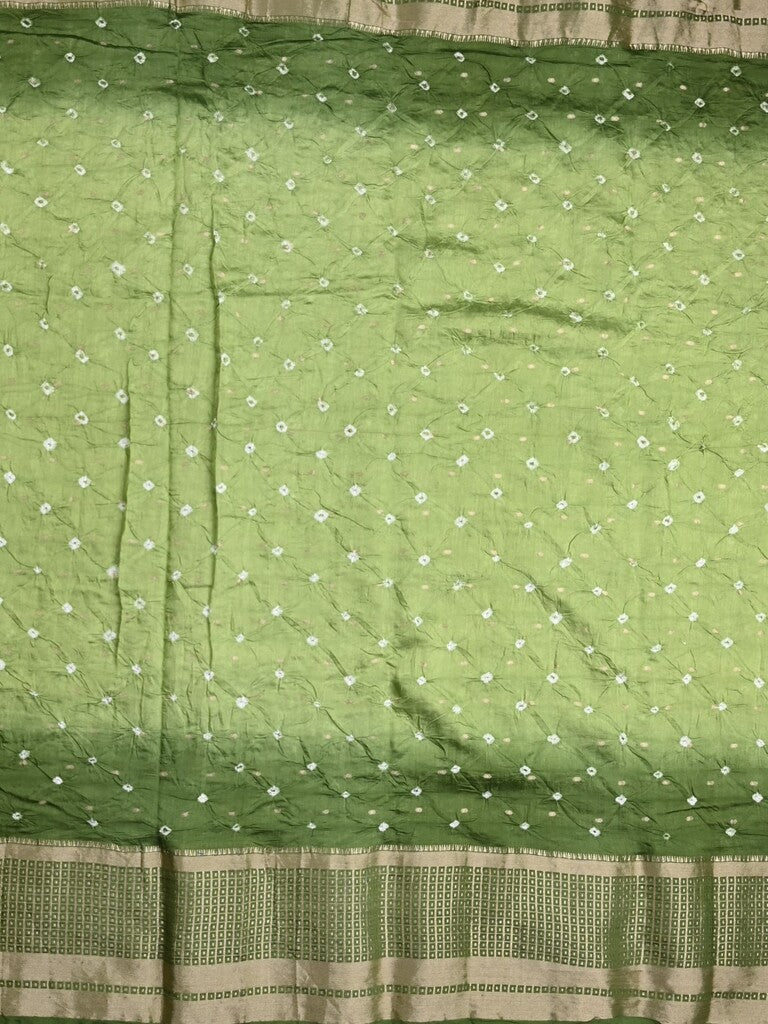 Munga bandhani fancy saree light green color allover work & zari border with contrast pallu and blouse