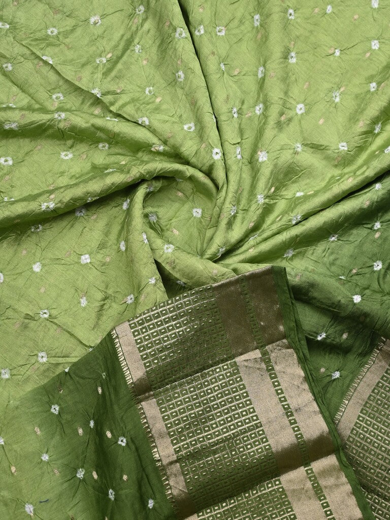 Munga bandhani fancy saree light green color allover work & zari border with contrast pallu and blouse