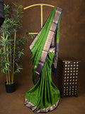Kanchi pattu saree parrot green color allover zari motifs & zari border with rich pallu and contrast plain blouse