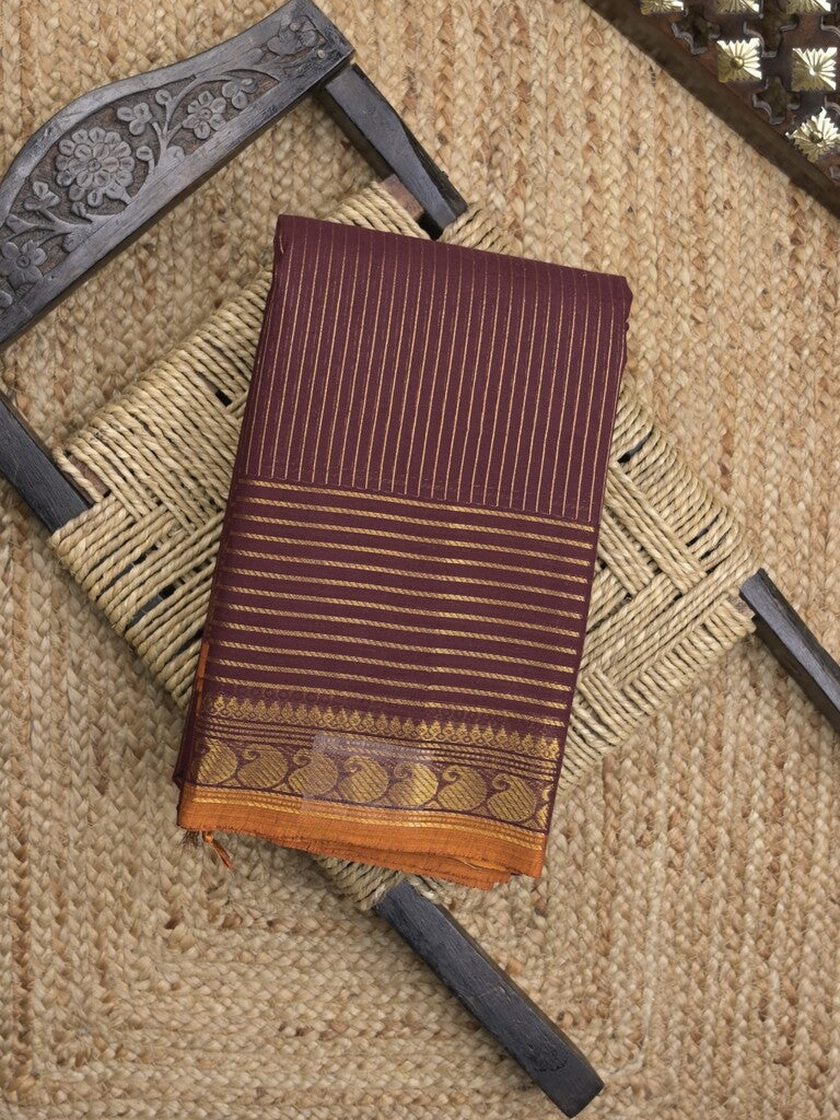 Kanchi cotton saree in maroon color with self pallu and matching blouse