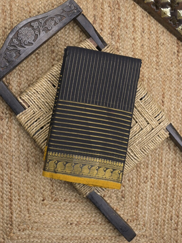 Kanchi cotton saree in black color with self pallu and matching blouse