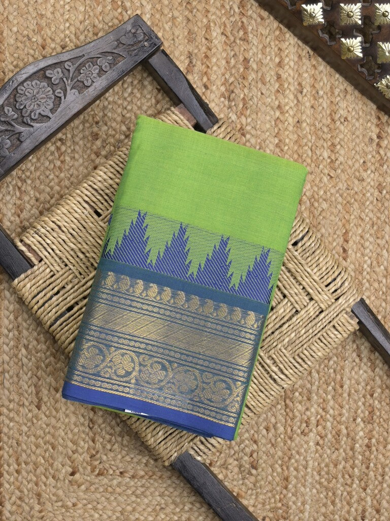 Kanchi cotton saree in parrot green color allover motifs with self pallu and matching blouse