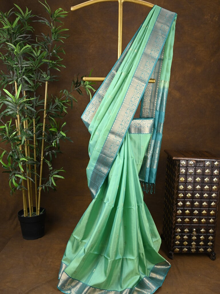 Kanchi pattu saree lux green color allover zari motifs & zari border with rich pallu and contrast plain blouse