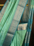 Kanchi pattu saree lux green color allover zari motifs & zari border with rich pallu and contrast plain blouse
