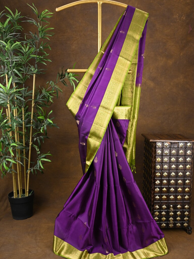 Kanchi pattu saree dark purple color allover zari motifs & zari border with rich pallu and contrast plain blouse