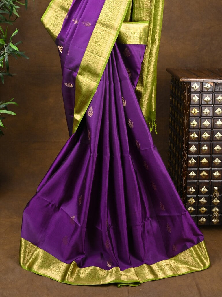 Kanchi pattu saree dark purple color allover zari motifs & zari border with rich pallu and contrast plain blouse