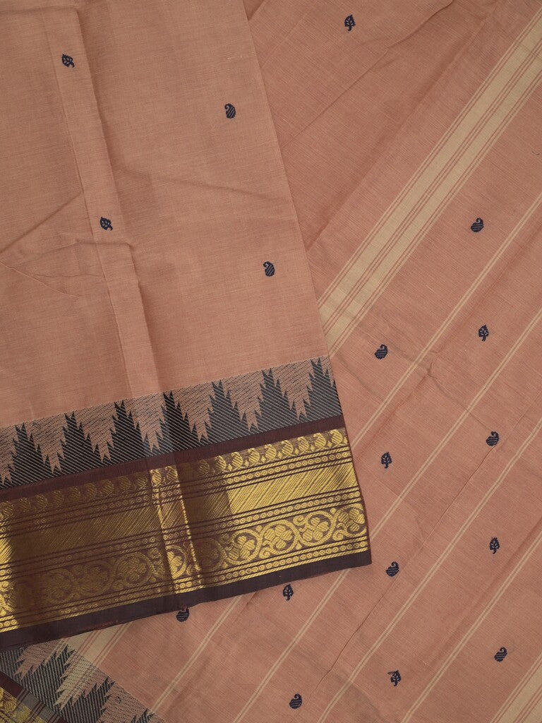 Kanchi cotton saree in peach color allover motifs with self pallu and matching blouse