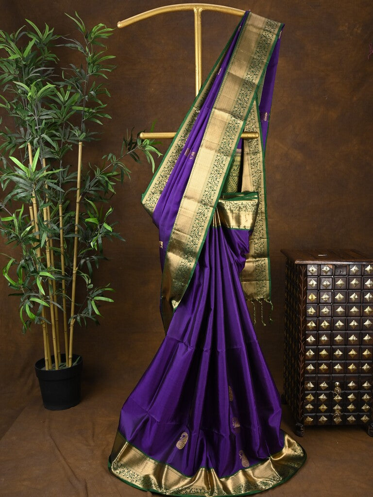 Kanchi pattu saree dark blue color allover zari motifs & zari border with rich pallu and contrast plain blouse