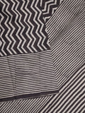 Maheswari fancy saree in black and white color with printed pallu and attached blouse