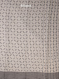 Maheswari fancy saree in black and white color with printed pallu and attached blouse