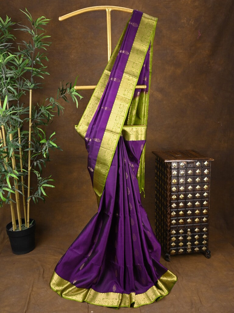 Kanchi pattu saree violet color allover zari motifs & zari border with rich pallu and contrast plain blouse