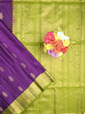 Kanchi pattu saree dark purple color allover zari motifs & zari border with rich pallu and contrast plain blouse