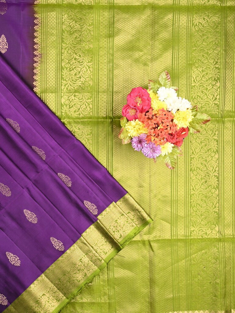 Kanchi pattu saree dark purple color allover zari motifs & zari border with rich pallu and contrast plain blouse