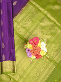 Kanchi pattu saree dark purple color allover zari motifs & zari border with rich pallu and contrast plain blouse