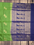 Kanchi pattu saree parrot green color allover zari motifs & zari border with rich pallu and contrast plain blouse