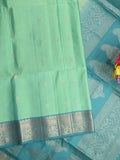 Kanchi pattu saree lux green color allover zari motifs & zari border with rich pallu and contrast plain blouse