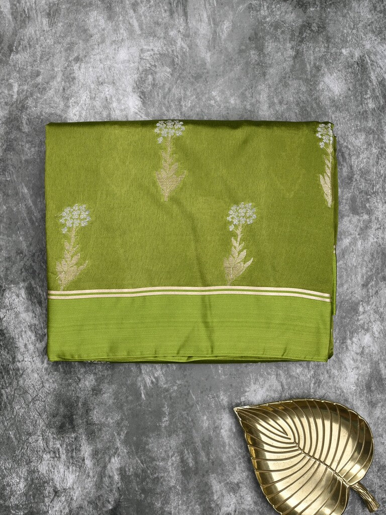 Raw mango fancy saree parrot green color allover zari motifs & zari border with zari pallu and attached self blouse