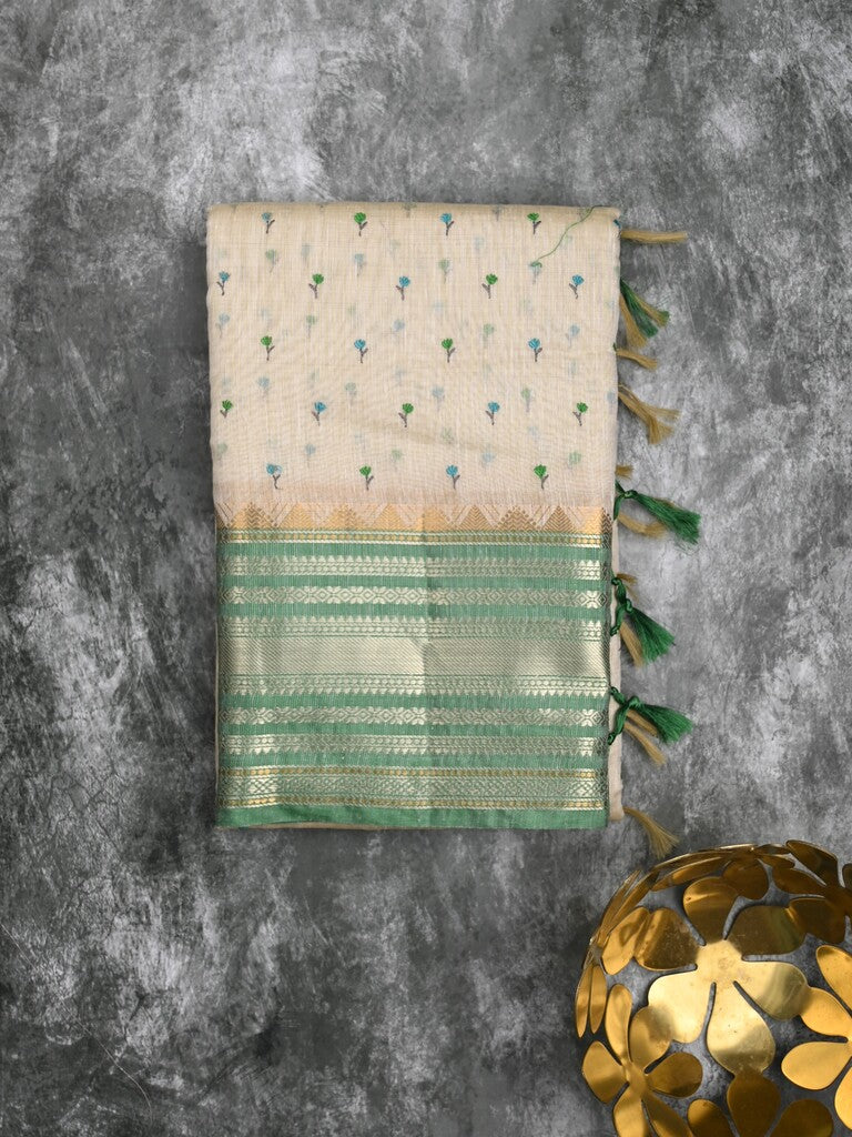 Chanderi fancy saree cream color allover zari motifs & zari border with zari pallu and attached contrast plain blouse