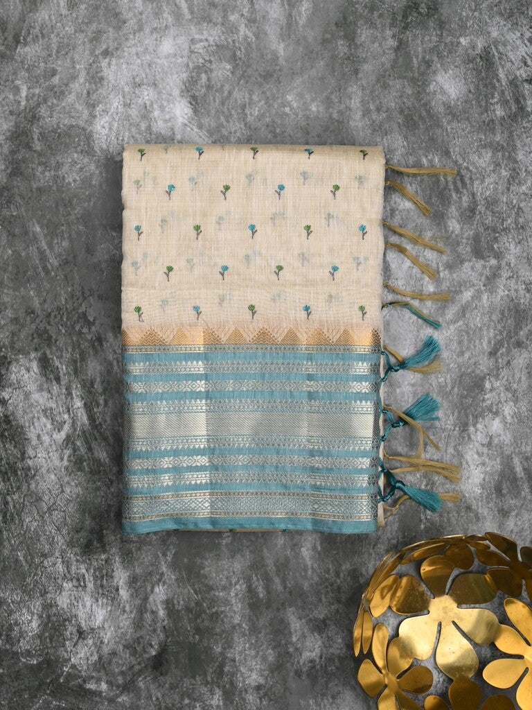 Chanderi fancy saree cream color allover zari motifs & zari border with zari pallu and attached contrast plain blouse