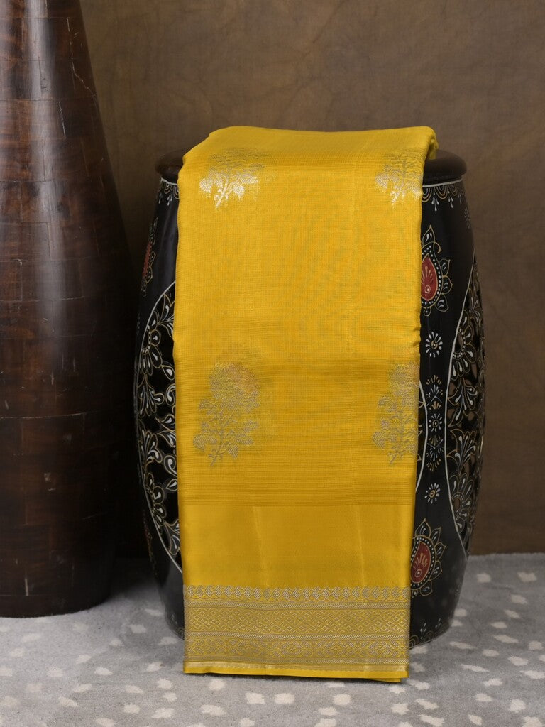 Pure kota fancy saree golden yellow color allover zari motifs & zari border with rich pallu and attached blouse