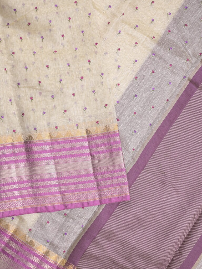 Chanderi fancy saree cream color allover zari motifs & zari border with zari pallu and attached contrast plain blouse