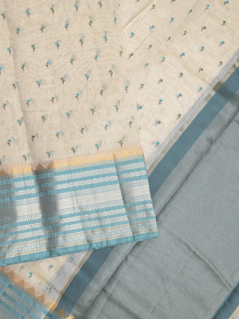 Chanderi fancy saree cream color allover zari motifs & zari border with zari pallu and attached contrast plain blouse