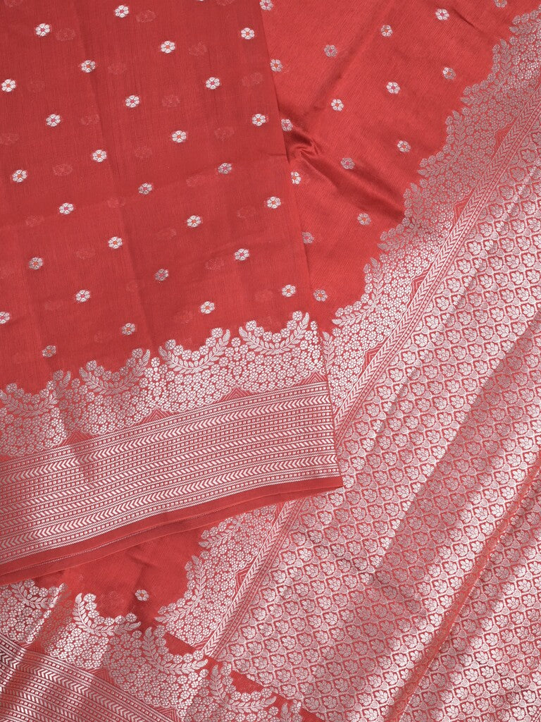 Raw mango fancy saree red color allover zari motifs & zari border with zari pallu and attached self blouse