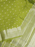 Raw mango fancy saree parrot green color allover zari motifs & zari border with zari pallu and attached self blouse
