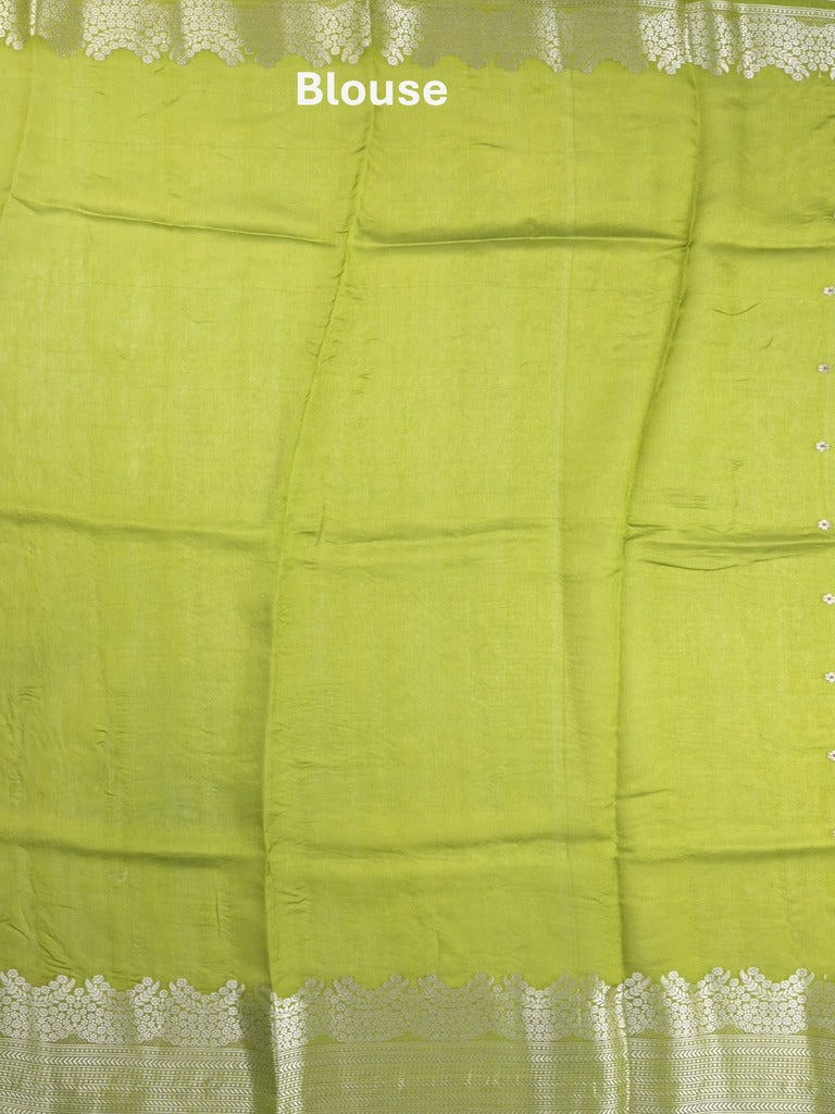 Raw mango fancy saree parrot green color allover zari motifs & zari border with zari pallu and attached self blouse