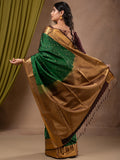 Kanchi pattu saree bottle green color allover zari motifs & zari border with rich pallu and contrast plain blouse