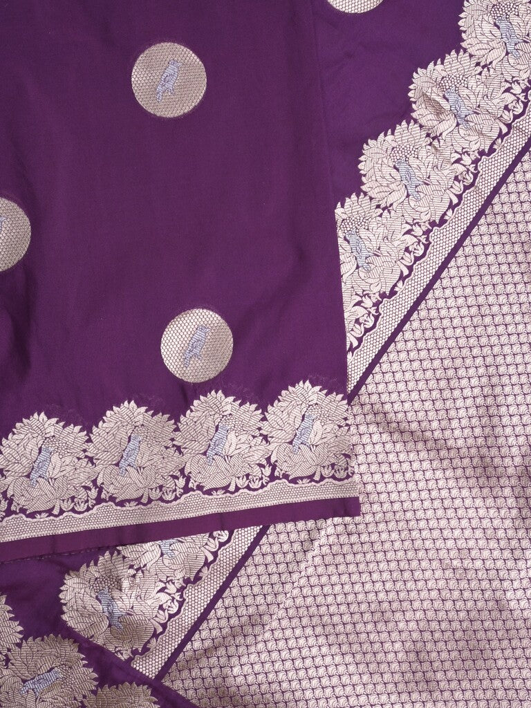 Raw mango fancy saree violet color allover zari motifs & zari border with zari pallu and attached self blouse