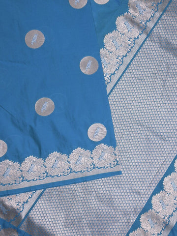 Raw mango fancy saree blue color allover zari motifs & zari border with zari pallu and attached self blouse