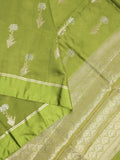 Raw mango fancy saree parrot green color allover zari motifs & zari border with zari pallu and attached self blouse
