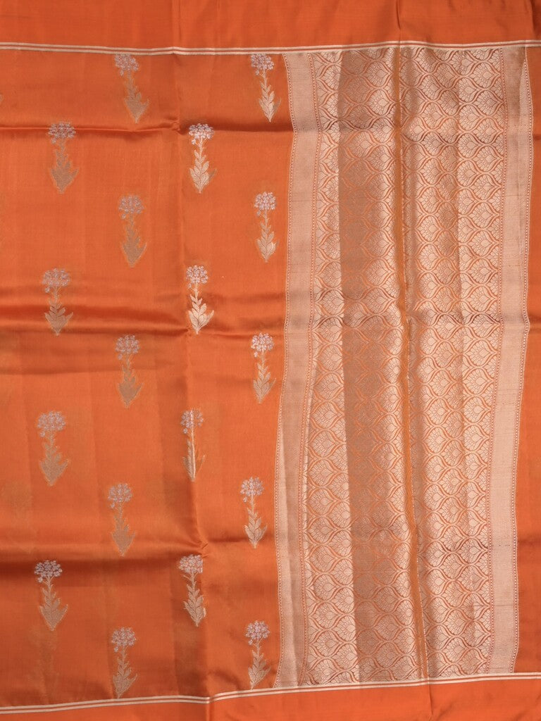 Raw mango fancy saree orange color allover zari motifs & zari border with zari pallu and attached self blouse