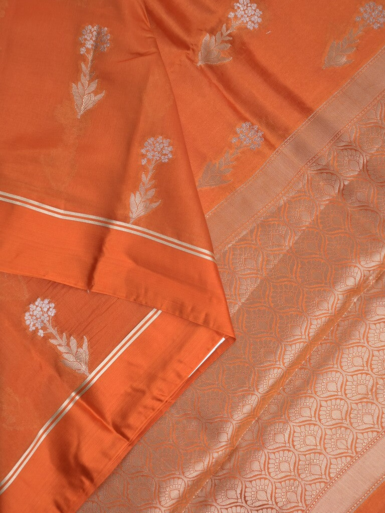 Raw mango fancy saree orange color allover zari motifs & zari border with zari pallu and attached self blouse