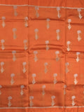 Raw mango fancy saree orange color allover zari motifs & zari border with zari pallu and attached self blouse