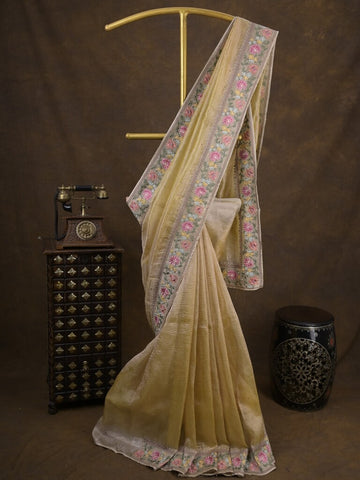 Tissue crush fancy saree light yellow color allover plain & embroidery border with running pallu and printed blouse