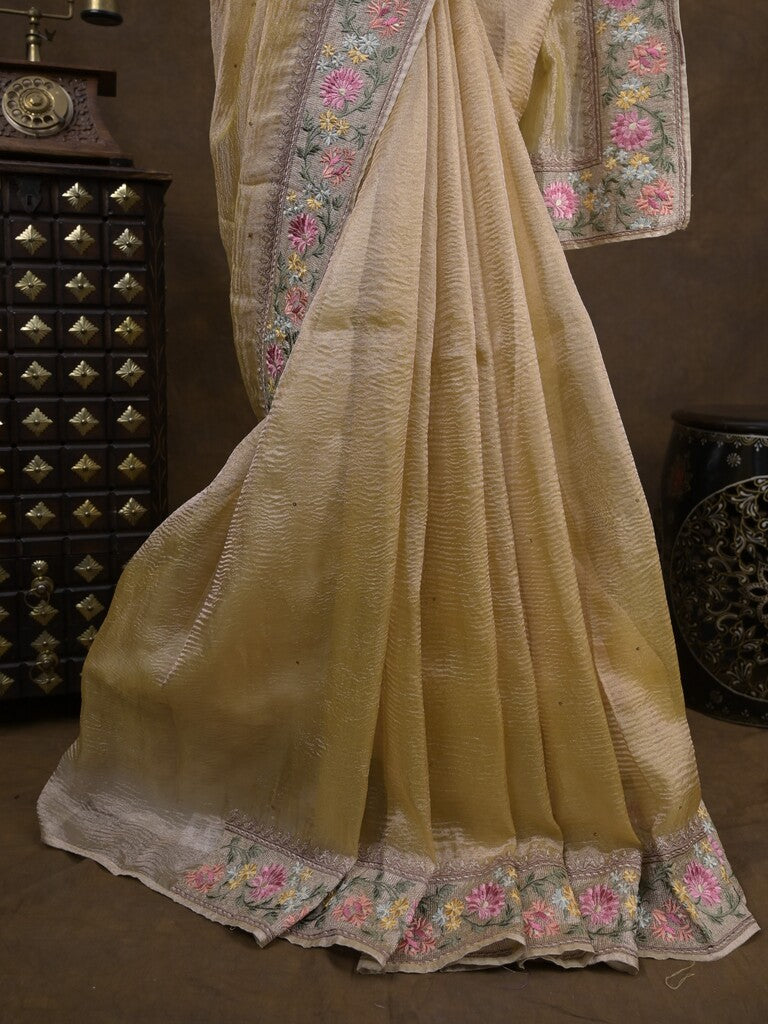 Tissue crush fancy saree light yellow color allover plain & embroidery border with running pallu and printed blouse