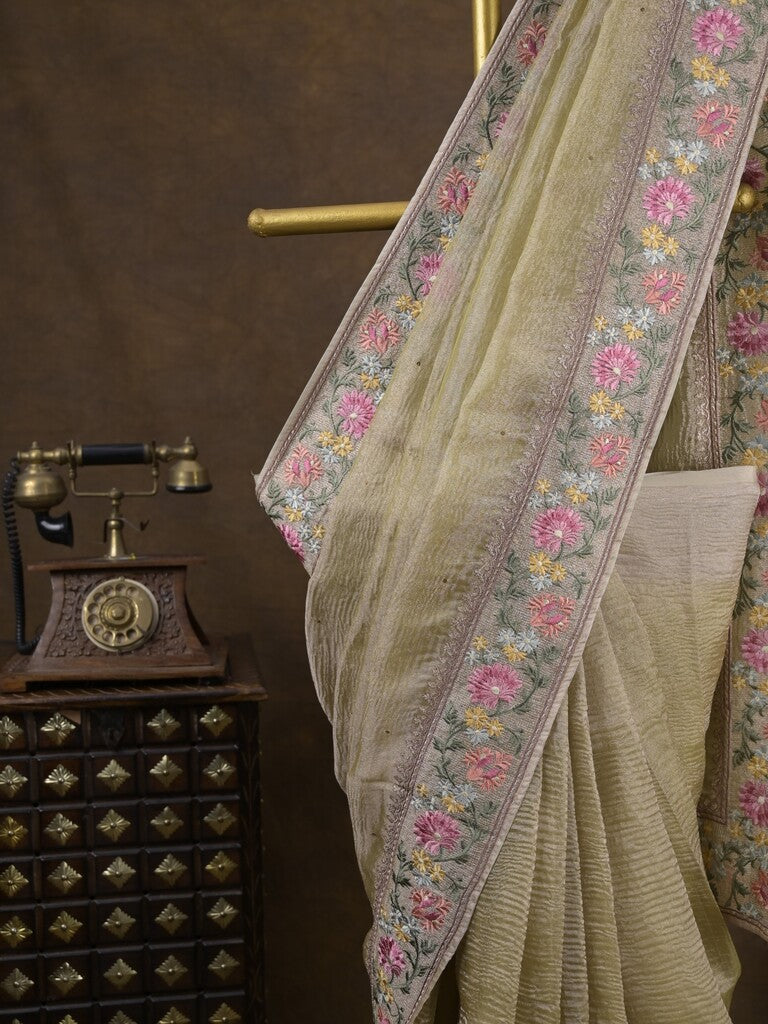 Tissue crush fancy saree light olive green color allover plain & embroidery border with running pallu and printed blouse