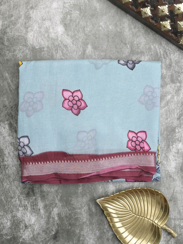 Mangalagiri fancy printed saree in light blue color with zari border and plain contrast blouse