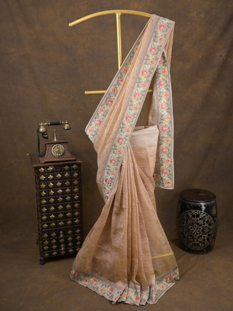 Tissue crush fancy saree light beige color allover plain & embroidery border with running pallu and printed blouse