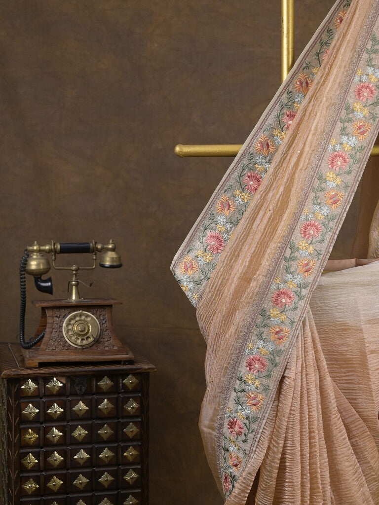 Tissue crush fancy saree light beige color allover plain & embroidery border with running pallu and printed blouse