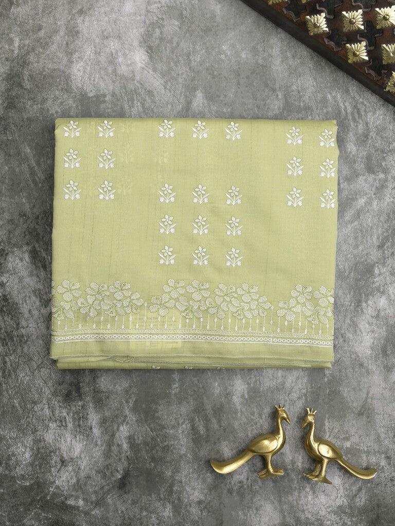 Tussar fancy saree in light green color allover embroidery & zari border with self pallu and plain blouse