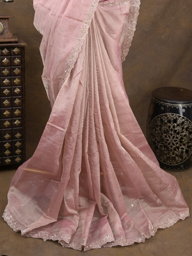 Tissue crush fancy saree light pink color allover motifs & embroidery border with running pallu and printed blouse