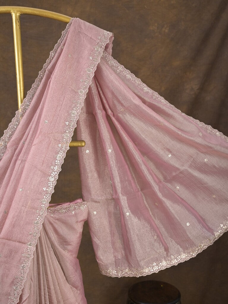 Tissue crush fancy saree light pink color allover motifs & embroidery border with running pallu and printed blouse