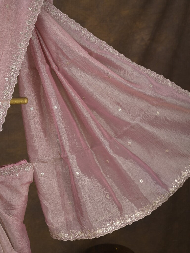 Tissue crush fancy saree light pink color allover motifs & embroidery border with running pallu and printed blouse
