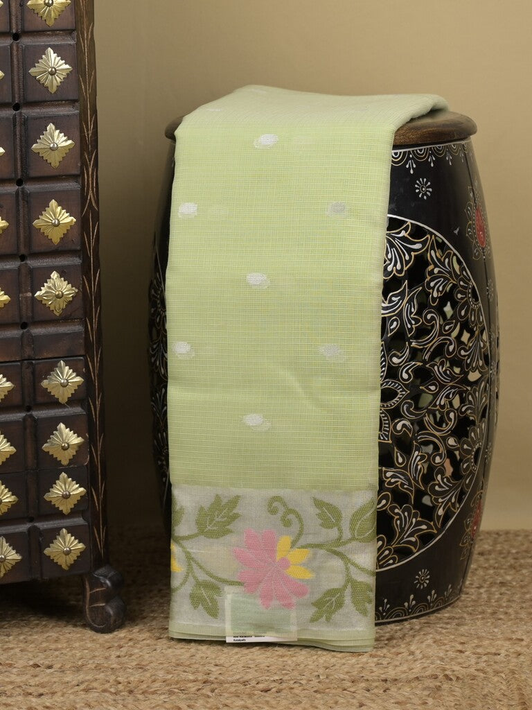 Kota fancy sarees in pastel green color allover motifs with zari border and matching blouse