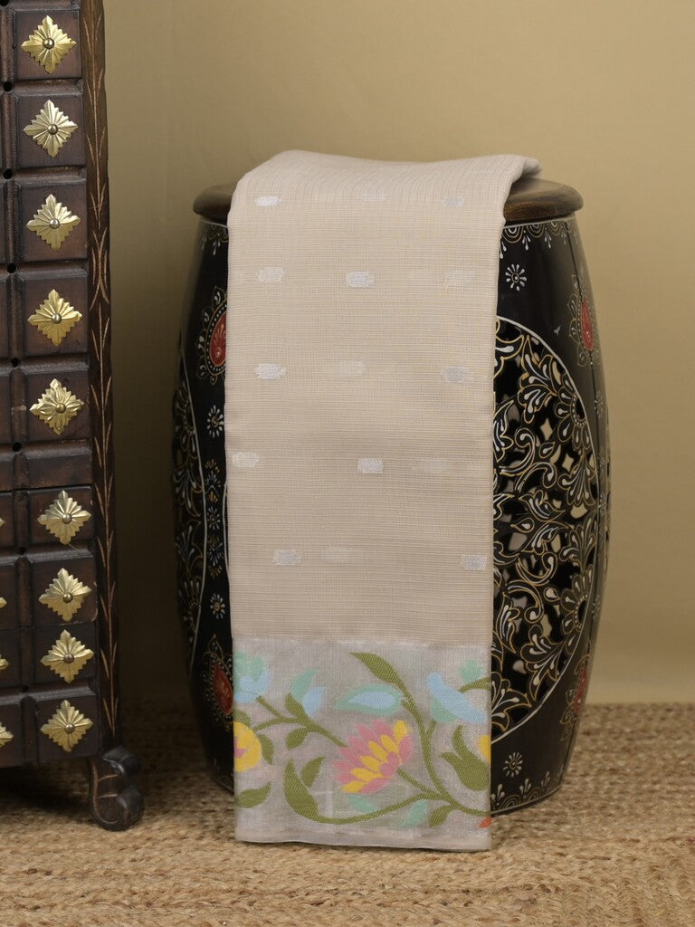 Kota fancy sarees in light beige color allover motifs with zari border and matching blouse