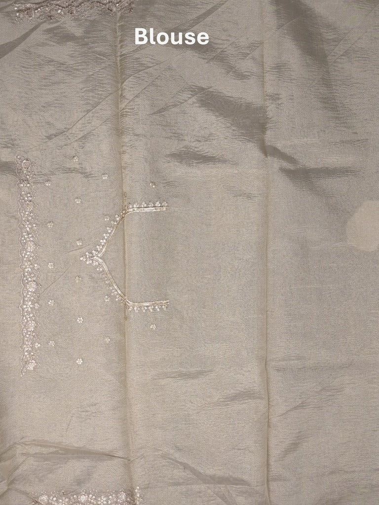 Tissue crush fancy saree light grey color allover motifs & embroidery border with running pallu and printed blouse