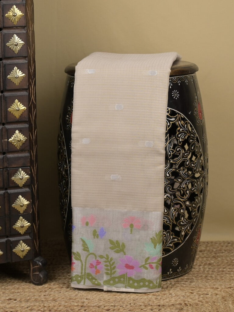 Kota fancy sarees in light beige color allover motifs with zari border and matching blouse